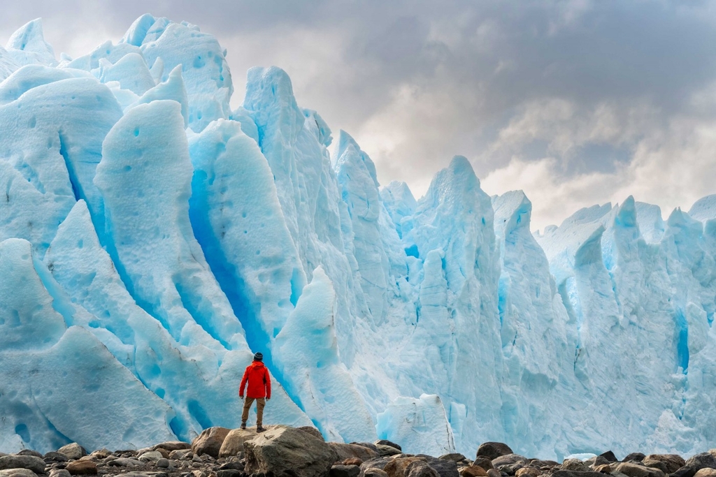 Man in front of ice